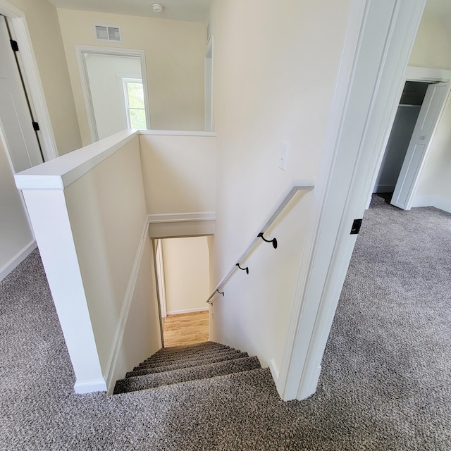 2109 Schippers Ln, Kalamazoo, MI 49048 - stairway with carpet and baseboards
