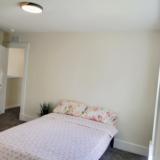 2109 Schippers Ln, Kalamazoo, MI 49048 - bedroom featuring dark colored carpet and baseboards