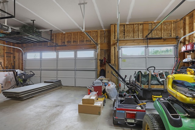 1819 Gloryfield Dr SW, Byron Center, MI 49315 - garage featuring a garage door opener