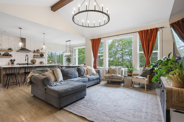 1819 Gloryfield Dr SW, Byron Center, MI 49315 - living area featuring a chandelier and light wood finished floors