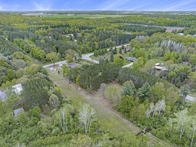 19030 W Almy Rd, Howard City, MI 49329 - aerial overview of property's location featuring a forest
