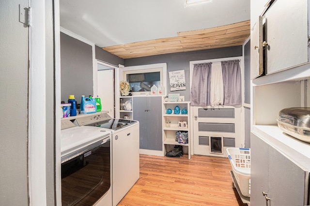 19030 W Almy Rd, Howard City, MI 49329 - kitchen with washing machine and clothes dryer and light wood-style floors