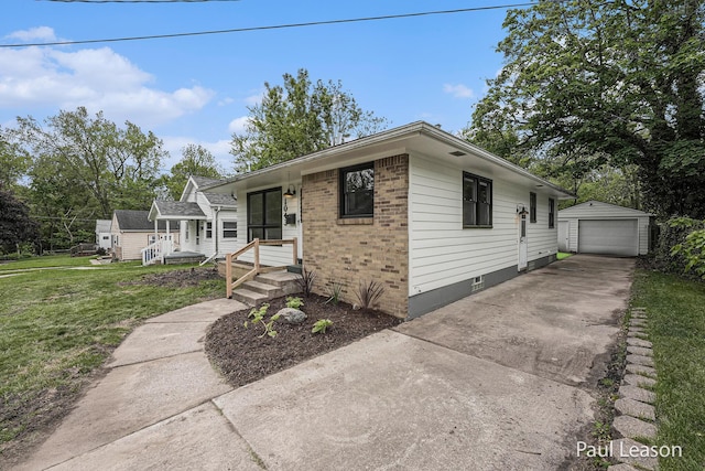 1043 Eastern Ave NE, Grand Rapids, MI 49503 - ranch-style house featuring driveway, an outdoor structure, a garage, a front lawn, and brick siding
