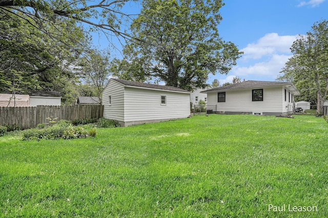 1043 Eastern Ave NE, Grand Rapids, MI 49503 - view of yard featuring an outbuilding