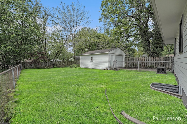 1043 Eastern Ave NE, Grand Rapids, MI 49503 - view of yard with a detached garage, an outdoor structure, and central AC