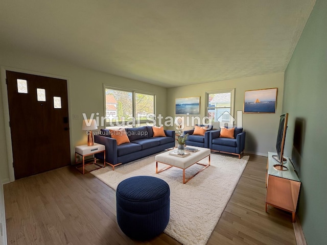 1043 Eastern Ave NE, Grand Rapids, MI 49503 - living area featuring wood finished floors and baseboards