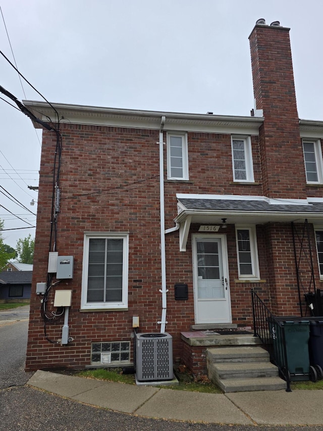 1516 W Webster Rd, Royal Oak, MI 48073 - multi unit property featuring cooling unit, a chimney, and brick siding