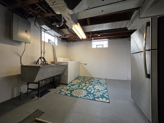 1516 W Webster Rd, Royal Oak, MI 48073 - basement featuring electric panel, freestanding refrigerator, washer and clothes dryer, and a sink