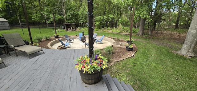 4447 Deer Creek Dr, Norton Shores, MI 49441 - wooden terrace featuring a fire pit