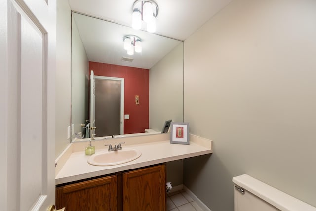 24609 Redwing Dr, Novi, MI 48374 - half bath featuring toilet, vanity, and tile patterned flooring