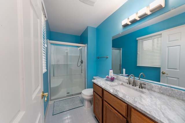 24609 Redwing Dr, Novi, MI 48374 - bathroom with a stall shower, toilet, vanity, and tile patterned flooring