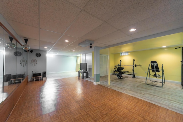 24609 Redwing Dr, Novi, MI 48374 - workout area with baseboards, recessed lighting, parquet flooring, and a drop ceiling