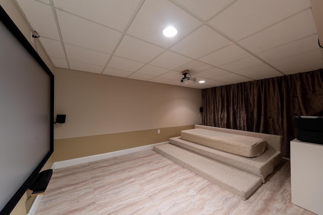 24609 Redwing Dr, Novi, MI 48374 - cinema room with a drop ceiling, baseboards, wood finished floors, and recessed lighting