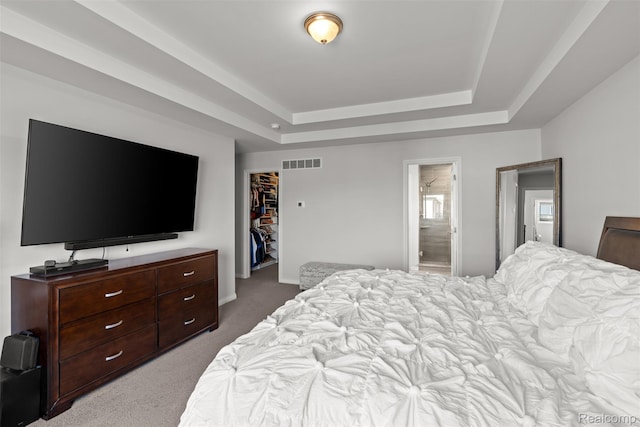 52690 Char Marie, Macomb, MI 48042 - carpeted bedroom with a tray ceiling, a spacious closet, a closet, and ensuite bathroom