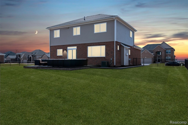 52690 Char Marie, Macomb, MI 48042 - rear view of property featuring brick siding, an outdoor living space, and central air condition unit