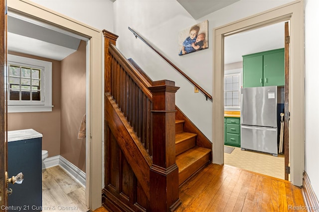 34642 Elm St, Wayne, MI 48184 - stairway featuring hardwood / wood-style flooring
