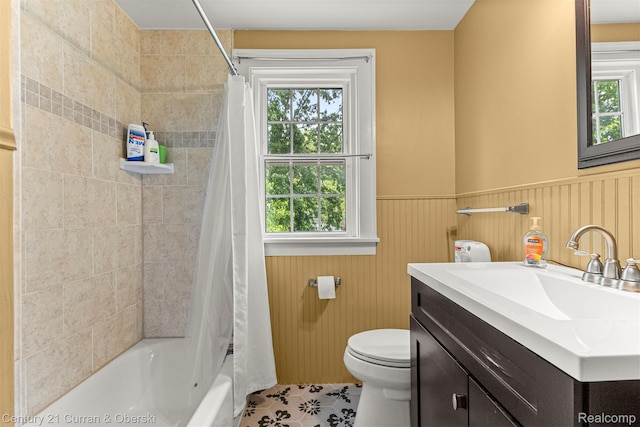 34642 Elm St, Wayne, MI 48184 - full bathroom featuring plenty of natural light, vanity, wainscoting, and shower / bath combo with shower curtain