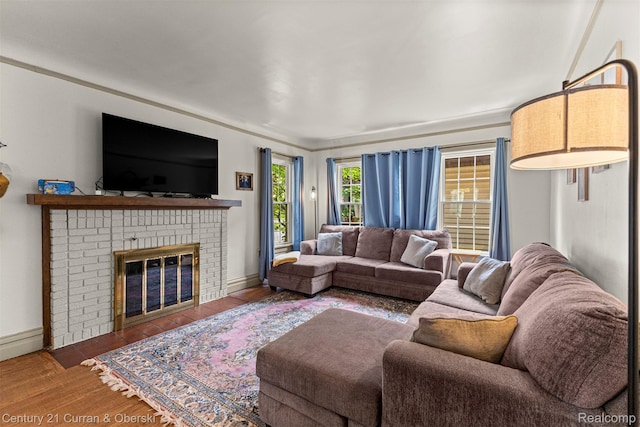 34642 Elm St, Wayne, MI 48184 - living room featuring a fireplace and wood finished floors