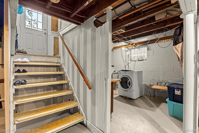 34642 Elm St, Wayne, MI 48184 - below grade area featuring washer and clothes dryer, stairway, and concrete block wall