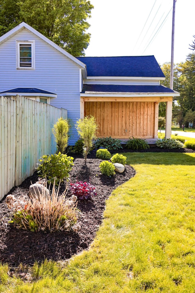 3016 143rd Ave, Dorr, MI 49323 - view of home's exterior featuring a lawn