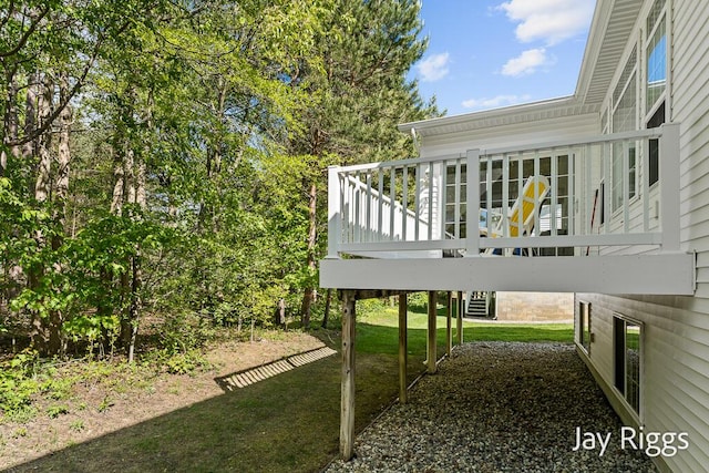 5702 Copper Sands Run Unit 101, Fruitport, MI 49415 - view of green lawn featuring a wooden deck
