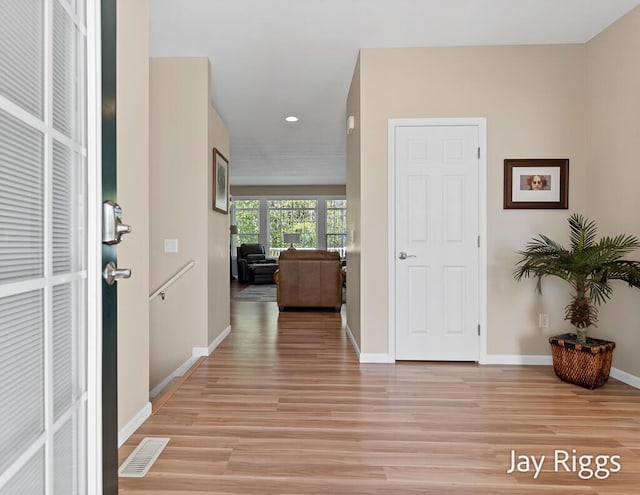 5702 Copper Sands Run Unit 101, Fruitport, MI 49415 - entryway featuring light wood-style floors, recessed lighting, and baseboards