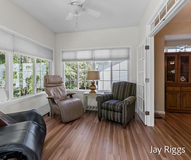 5702 Copper Sands Run Unit 101, Fruitport, MI 49415 - sunroom with french doors and wood finished floors