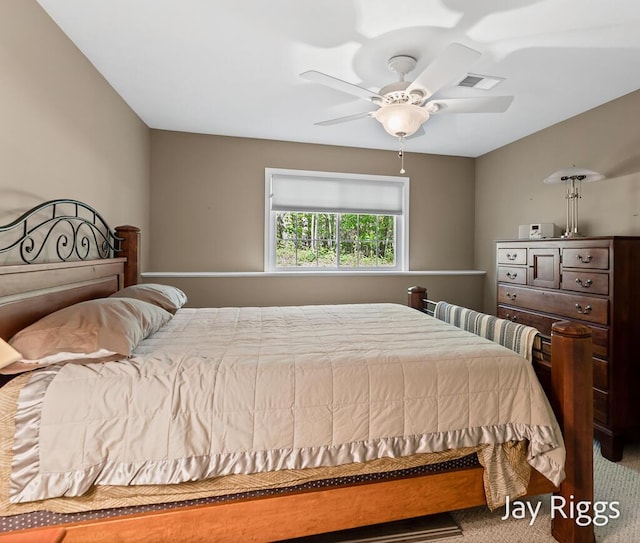 5702 Copper Sands Run Unit 101, Fruitport, MI 49415 - carpeted bedroom with ceiling fan