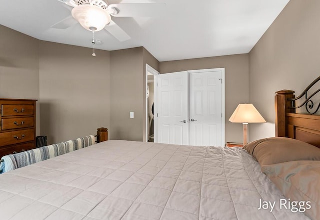 5702 Copper Sands Run Unit 101, Fruitport, MI 49415 - bedroom with a closet and ceiling fan