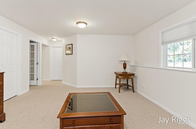 5702 Copper Sands Run Unit 101, Fruitport, MI 49415 - sitting room featuring carpet floors and baseboards