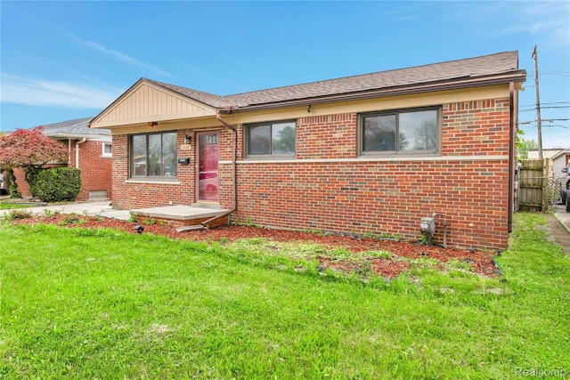 21608 Barton St, Saint Clair Shores, MI 48081 - view of front of property featuring brick siding and a shingled roof