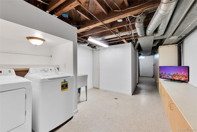 21608 Barton St, Saint Clair Shores, MI 48081 - laundry room featuring separate washer and dryer and baseboards