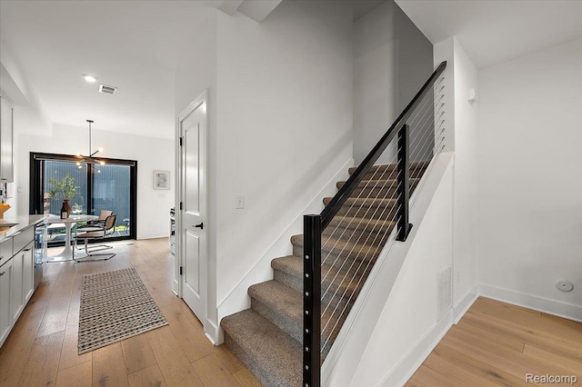 3303 Cochrane, Detroit, MI 48208 - stairs featuring wood-type flooring and recessed lighting
