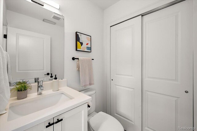 3303 Cochrane, Detroit, MI 48208 - half bath featuring vanity and toilet