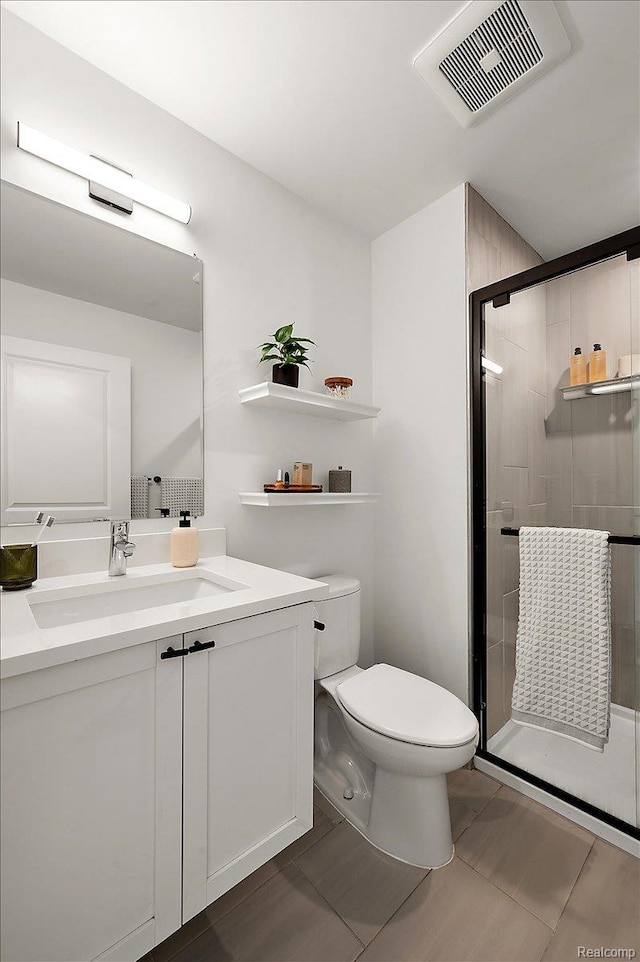 3303 Cochrane, Detroit, MI 48208 - bathroom featuring toilet, a shower stall, and vanity