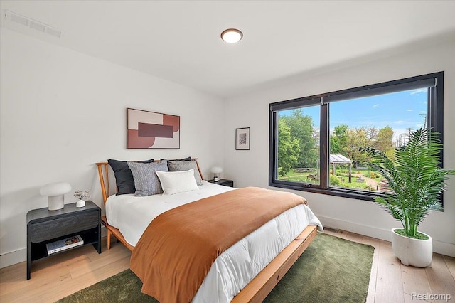 3303 Cochrane, Detroit, MI 48208 - bedroom featuring wood finished floors and baseboards