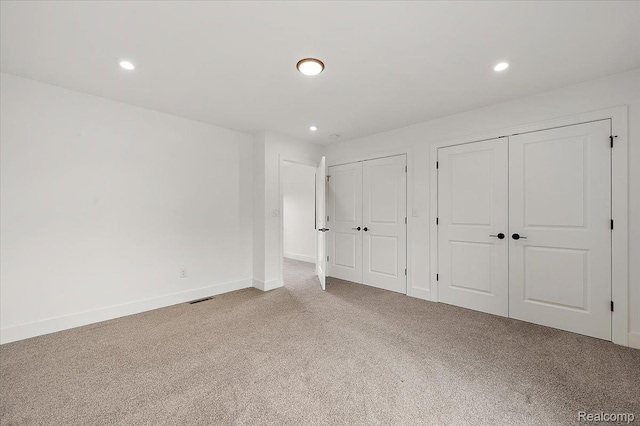 3303 Cochrane, Detroit, MI 48208 - unfurnished bedroom featuring multiple closets, carpet, recessed lighting, and baseboards