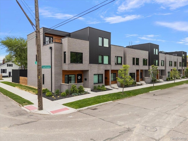 3303 Cochrane, Detroit, MI 48208 - view of front of house with a residential view and stucco siding