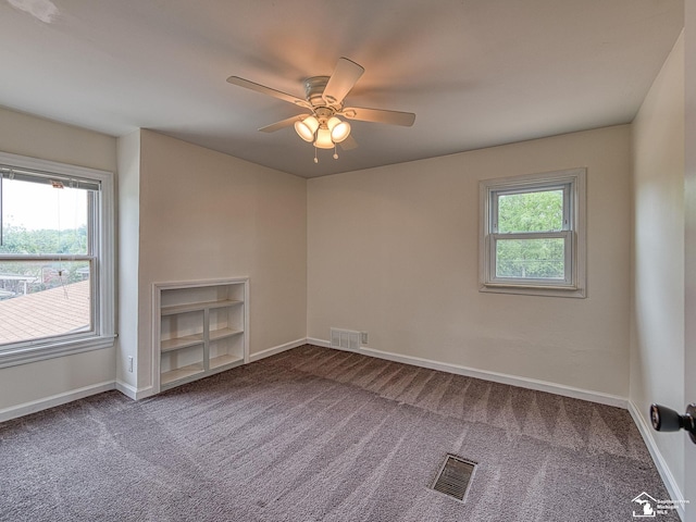 22933 Monterey Dr, Woodhaven, MI 48183 - carpeted spare room with a ceiling fan and baseboards