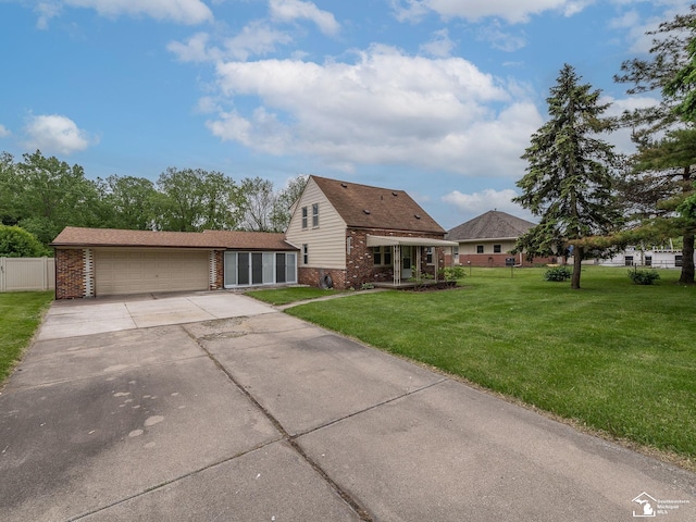 22933 Monterey Dr, Woodhaven, MI 48183 - view of front facade featuring brick siding, driveway, and a garage