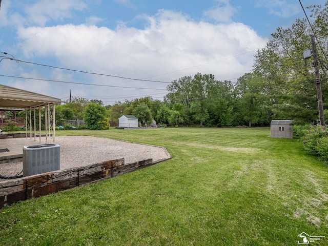 22933 Monterey Dr, Woodhaven, MI 48183 - view of green lawn with central air condition unit and a patio area