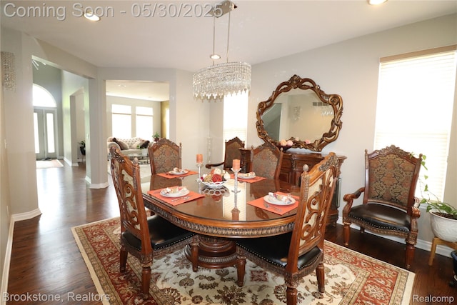 13961 Cobblestone Creek Dr, Belleville, MI 48111 - dining area with wood finished floors, recessed lighting, baseboards, and a chandelier