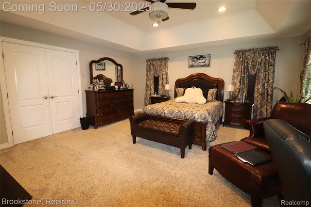 13961 Cobblestone Creek Dr, Belleville, MI 48111 - bedroom with light colored carpet, a tray ceiling, recessed lighting, and a ceiling fan