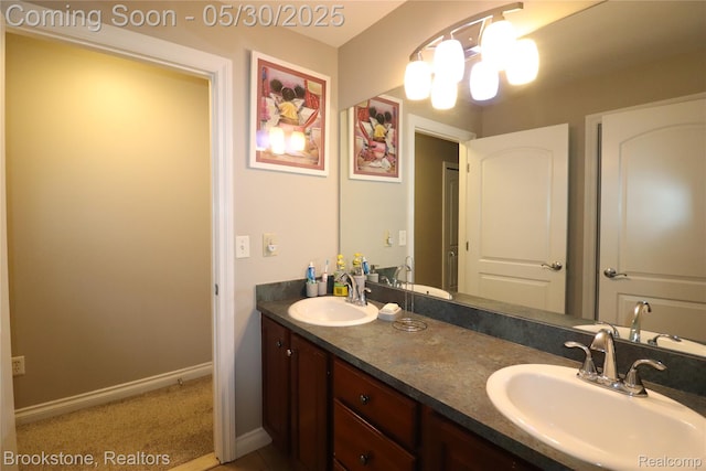 13961 Cobblestone Creek Dr, Belleville, MI 48111 - full bathroom with double vanity, baseboards, and a chandelier