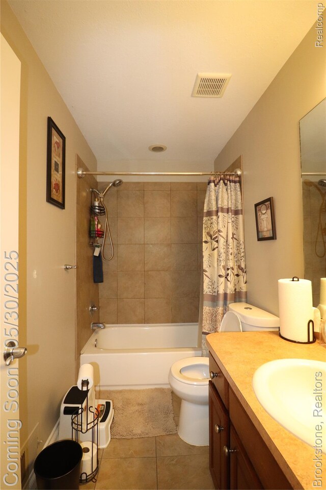 13961 Cobblestone Creek Dr, Belleville, MI 48111 - bathroom featuring tile patterned floors, vanity, toilet, and shower / bath combination with curtain