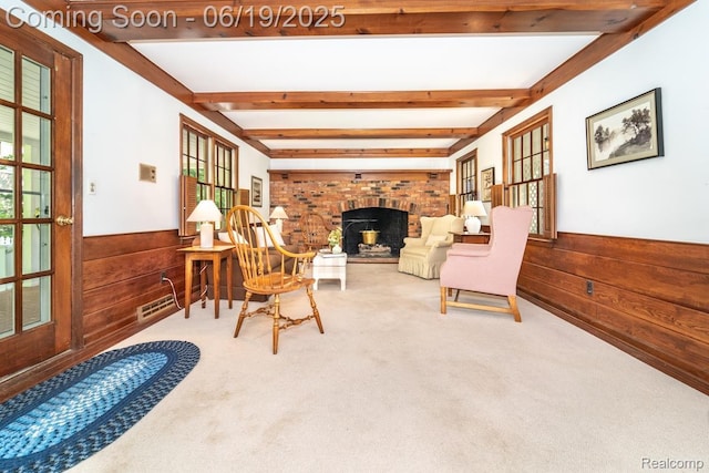 18410 Fermanagh Ct, Northville, MI 48168 - sitting room featuring carpet, beam ceiling, wooden walls, a wainscoted wall, and a fireplace