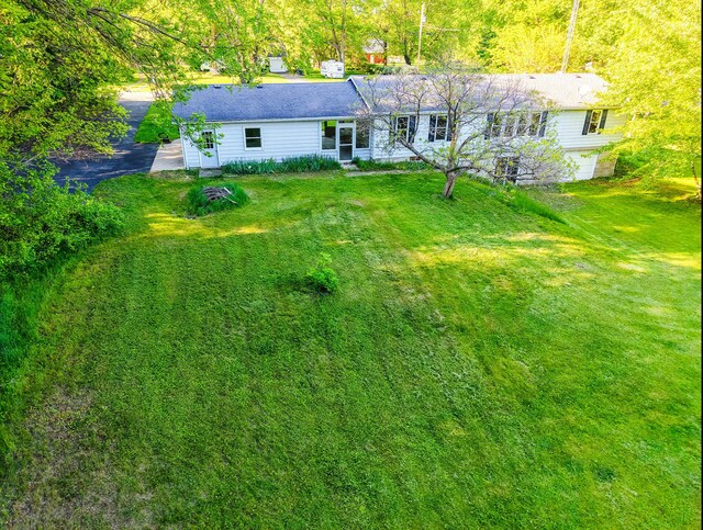 6340 Warren Woods Rd, Three Oaks, MI 49128 - rear view of house featuring a yard