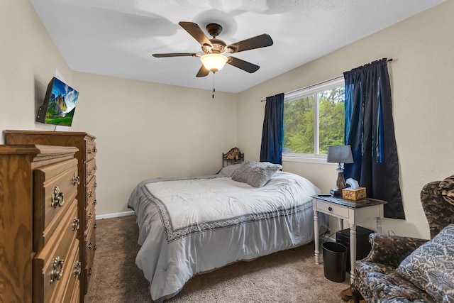 1094 Lake Marie Dr, Horton, MI 49246 - carpeted bedroom featuring ceiling fan and baseboards