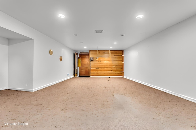 1094 Lake Marie Dr, Horton, MI 49246 - spare room featuring recessed lighting, baseboards, and carpet