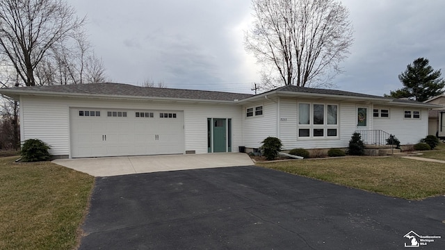 8263 Westwood St, Ida, MI 48140 - ranch-style home featuring asphalt driveway, a front lawn, and a garage